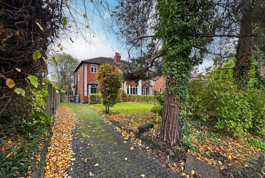 Main image of property: Woodlands Parkway, Timperley