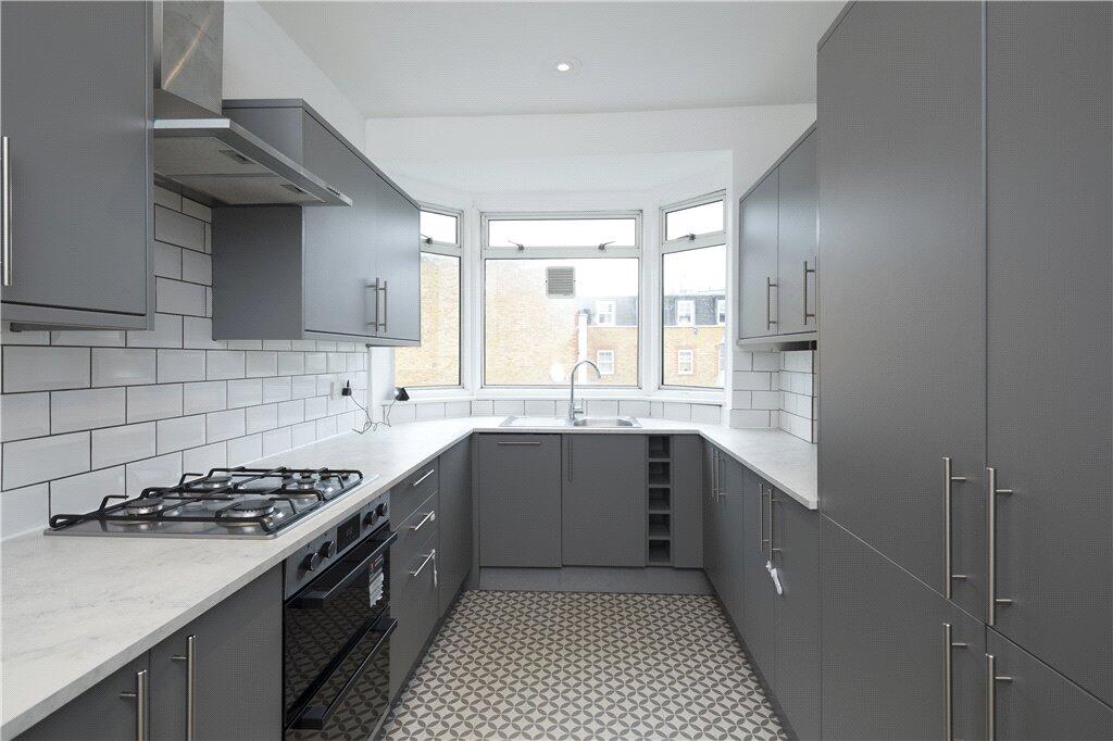 Main image of property: Coombe Lane, SW20