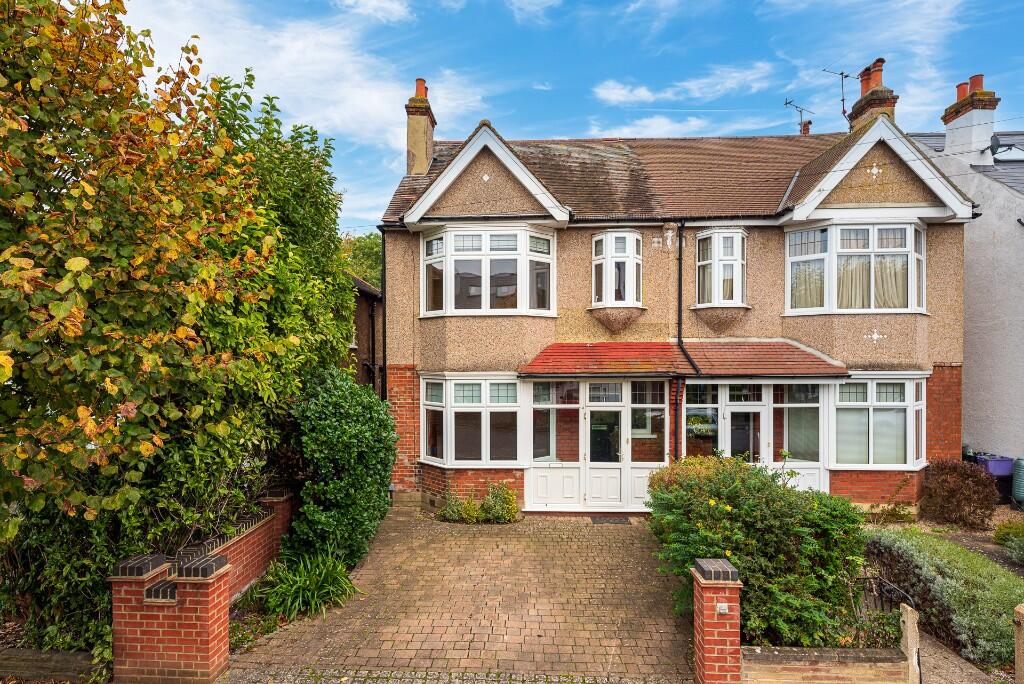 Main image of property: Camberley Avenue, London, SW20