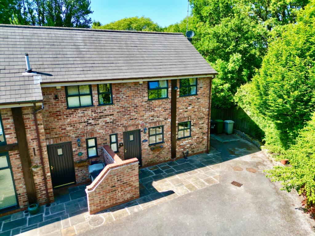 Main image of property: Woodhouse Farm Barns, Anson Road, Poynton, Stockport, Cheshire, SK12 1TD