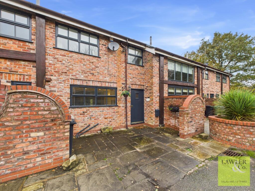 Main image of property: Woodhouse Farm Barns, Anson Road, Poynton, Stockport, Cheshire, SK12 1TD