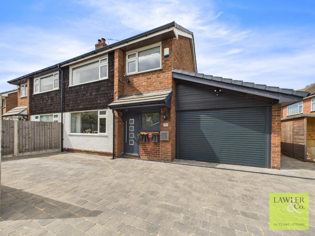 Main image of property: Tulworth Road, Poynton, Stockport, Cheshire, SK12 1BQ