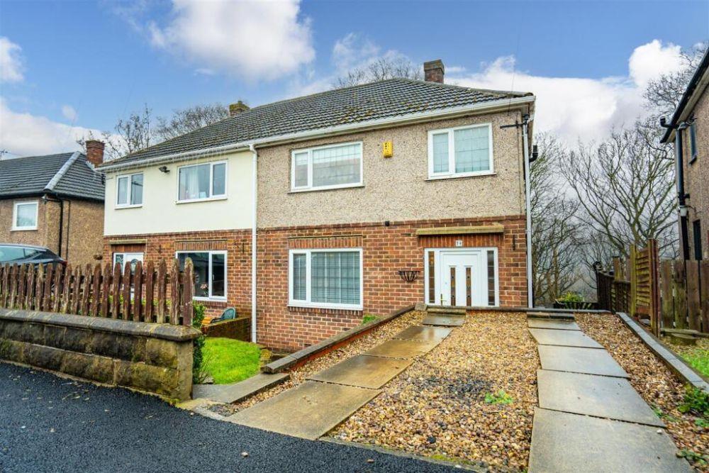 Main image of property: Woodedge Avenue, Huddersfield