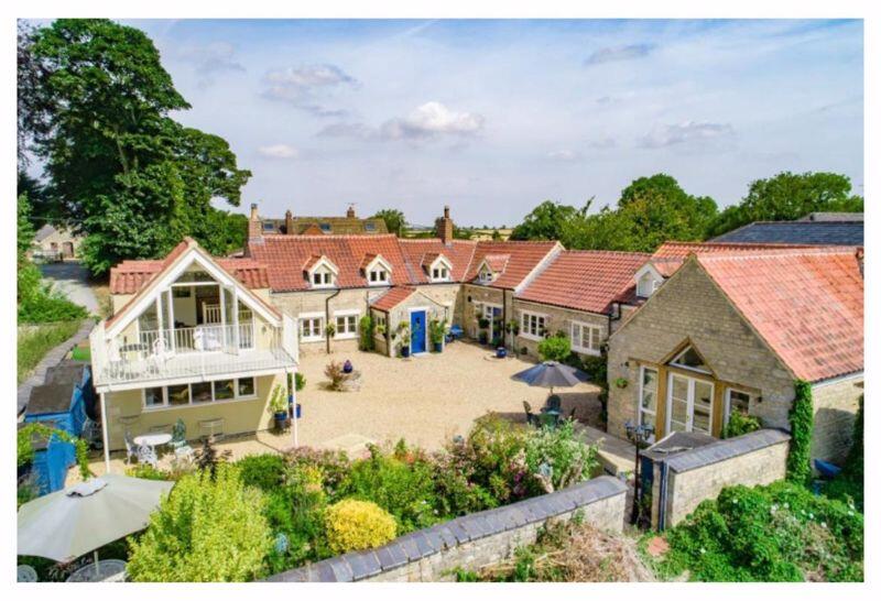 Main image of property: Character Property with Three Dwellings