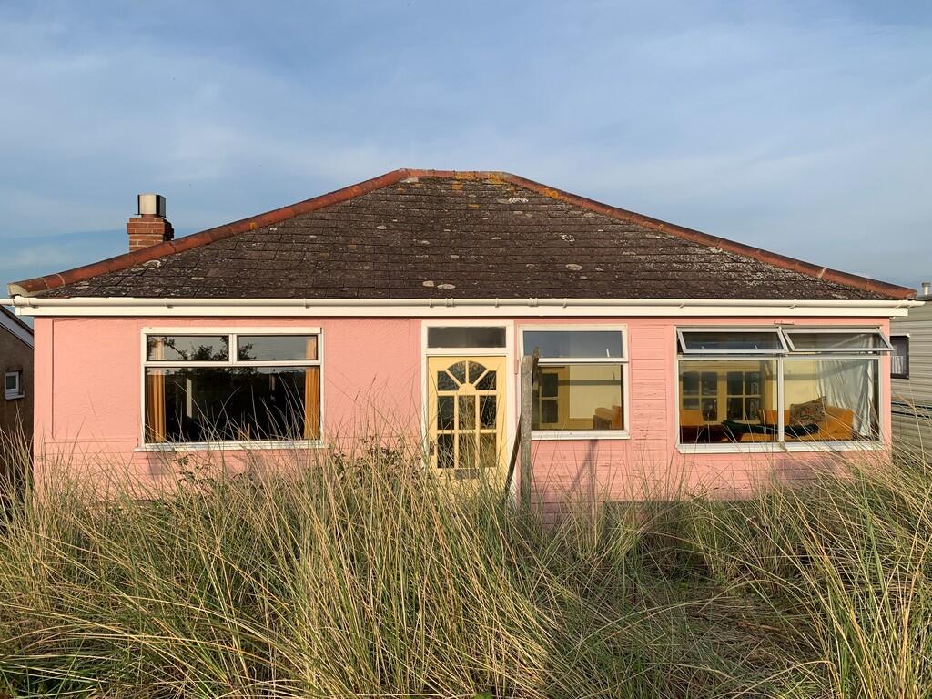 Main image of property: SNETTISHAM BEACH - Detached Holiday Chalet Overlooking Beach & Lake
