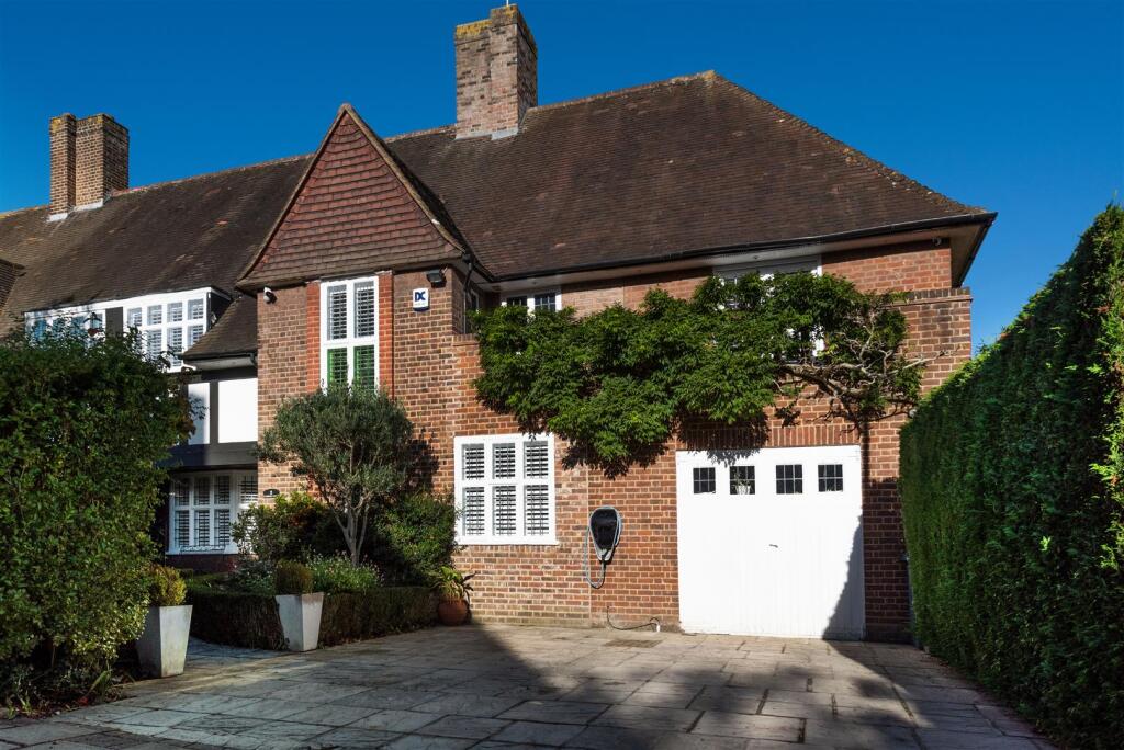 Main image of property: Raeburn Close, NW11