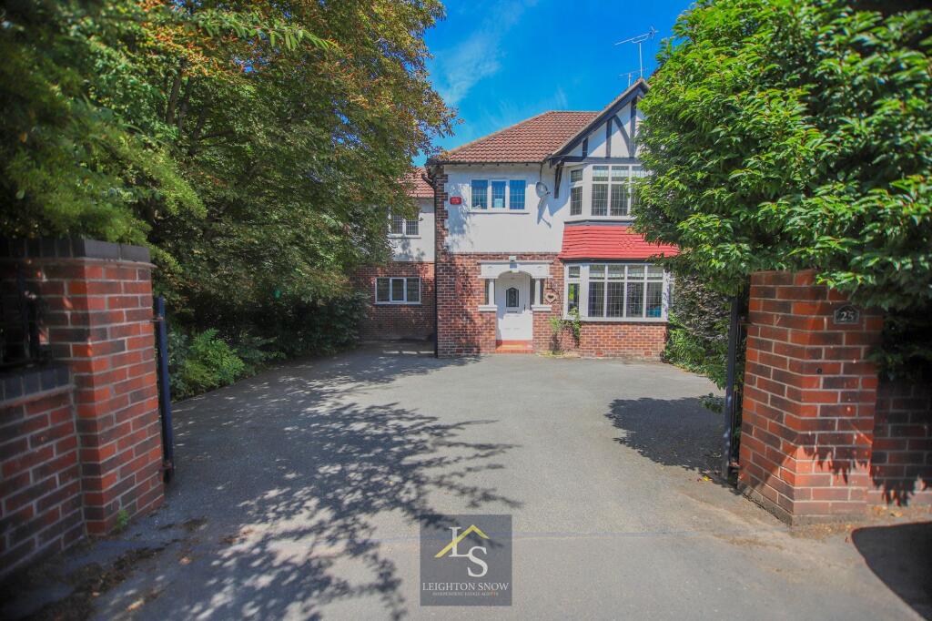 Main image of property: Bridge Lane, Bramhall, SK7