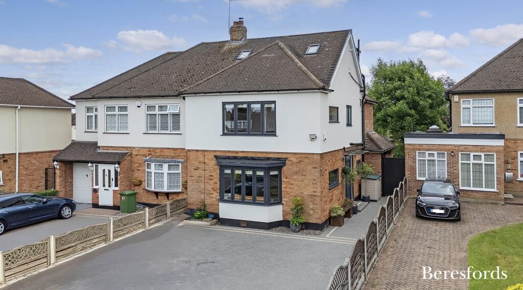 Main image of property: Chelsworth Drive, Romford, RM3