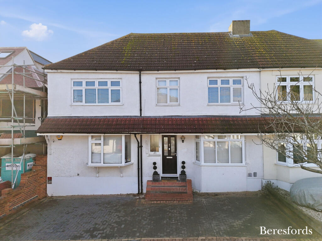 Main image of property: Woodstock Avenue, Romford, RM3