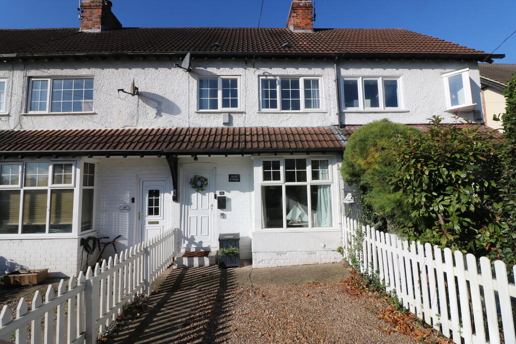 Main image of property: Holly Cottage, 54 Church Road
