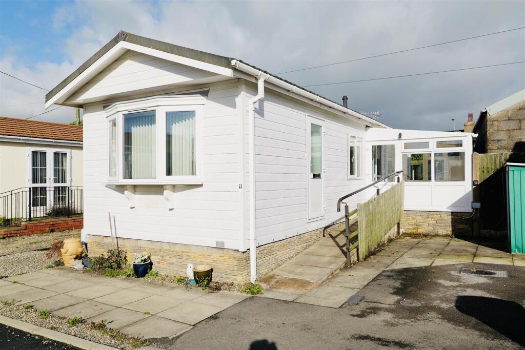 Main image of property: 11 Three Peaks Park, Ingleton