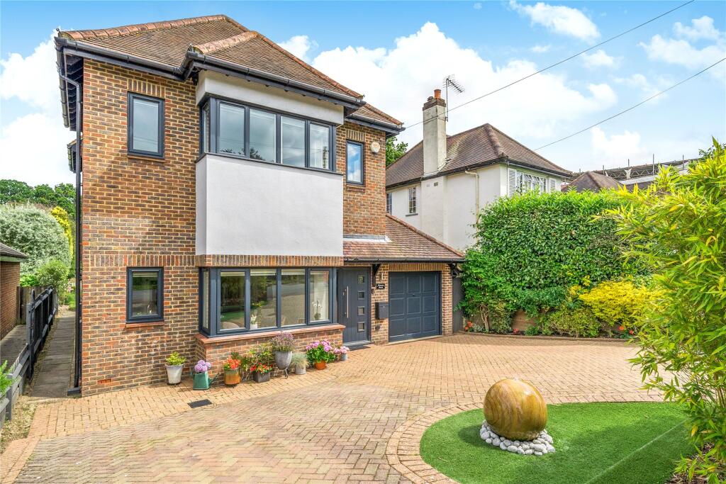 Main image of property: Woodbourne Drive, Claygate, Esher, KT10