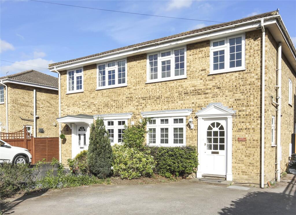 Main image of property: Pine Grove, Weybridge, Surrey, KT13