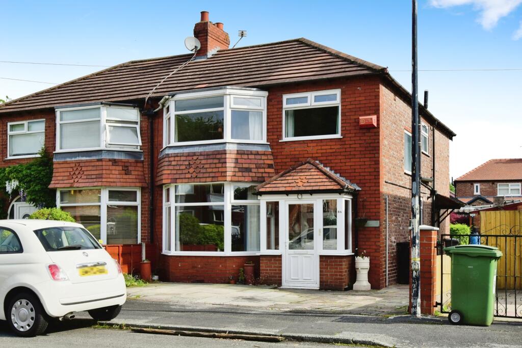 Main image of property: Downs Drive, Timperley, Altrincham, Greater Manchester, WA14