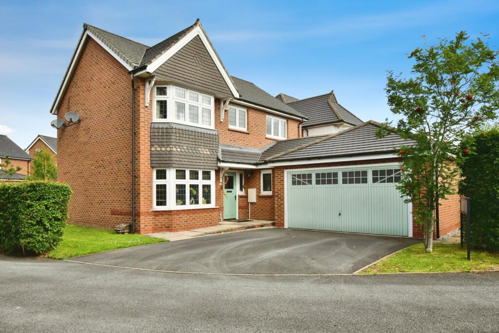 Main image of property: Poppywood Avenue, West Timperley, Altrincham, Greater Manchester, WA14