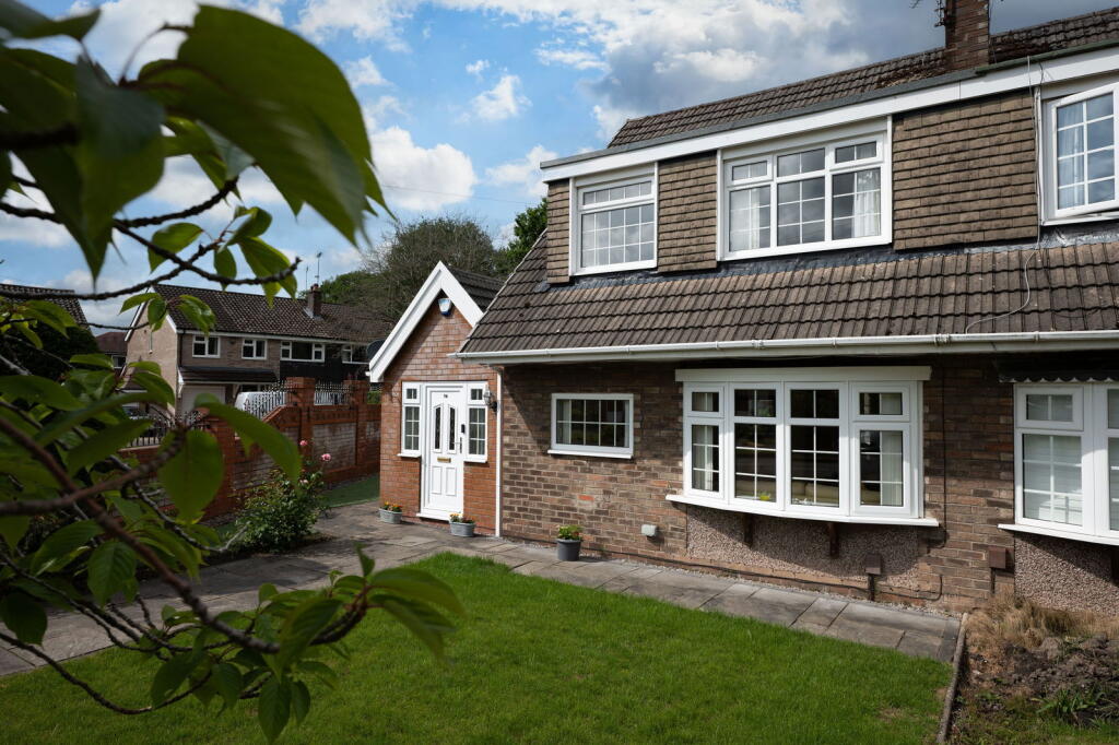 Main image of property: Corfe Crescent, Hazel Grove, Stockport SK7 5PR