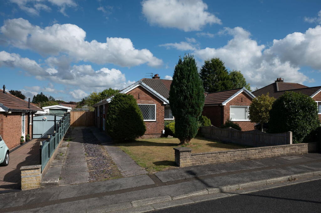 Main image of property: Cherry Tree Drive, Hazel Grove, Stockport SK7 6AS