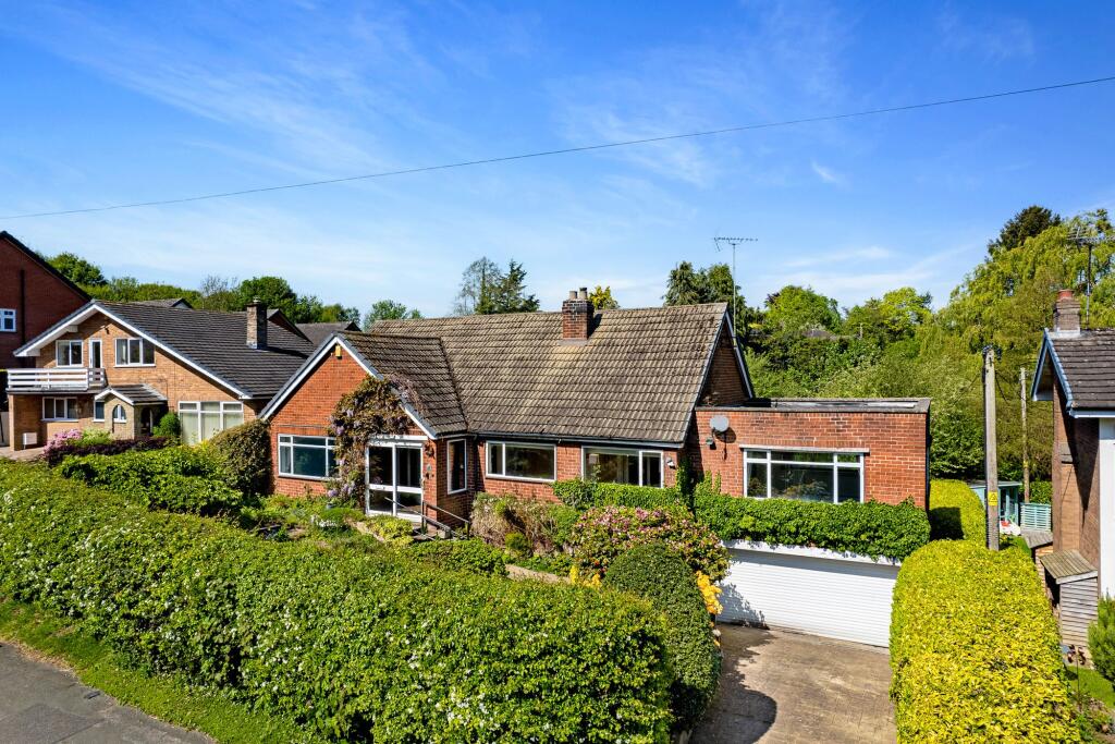 Main image of property: Home Full Of Potential On A Central Norley Plot