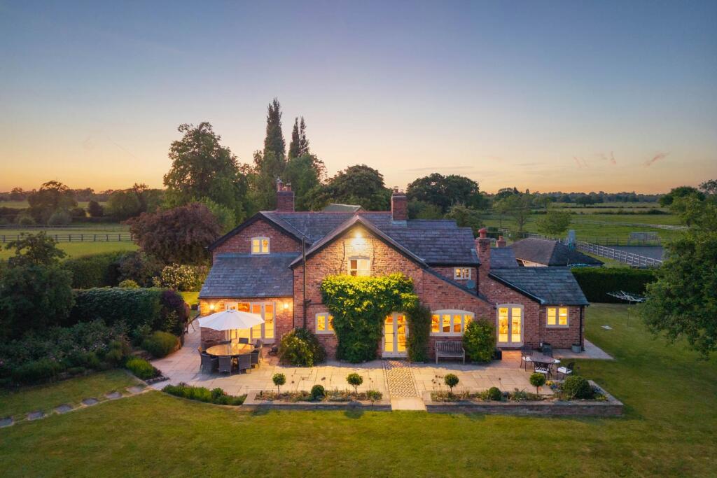 Main image of property: Exemplary Tarporley equestrian home with 13 acres