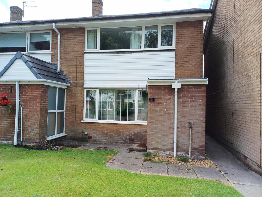 Main image of property: Orchard Close, Wilmslow, SK9