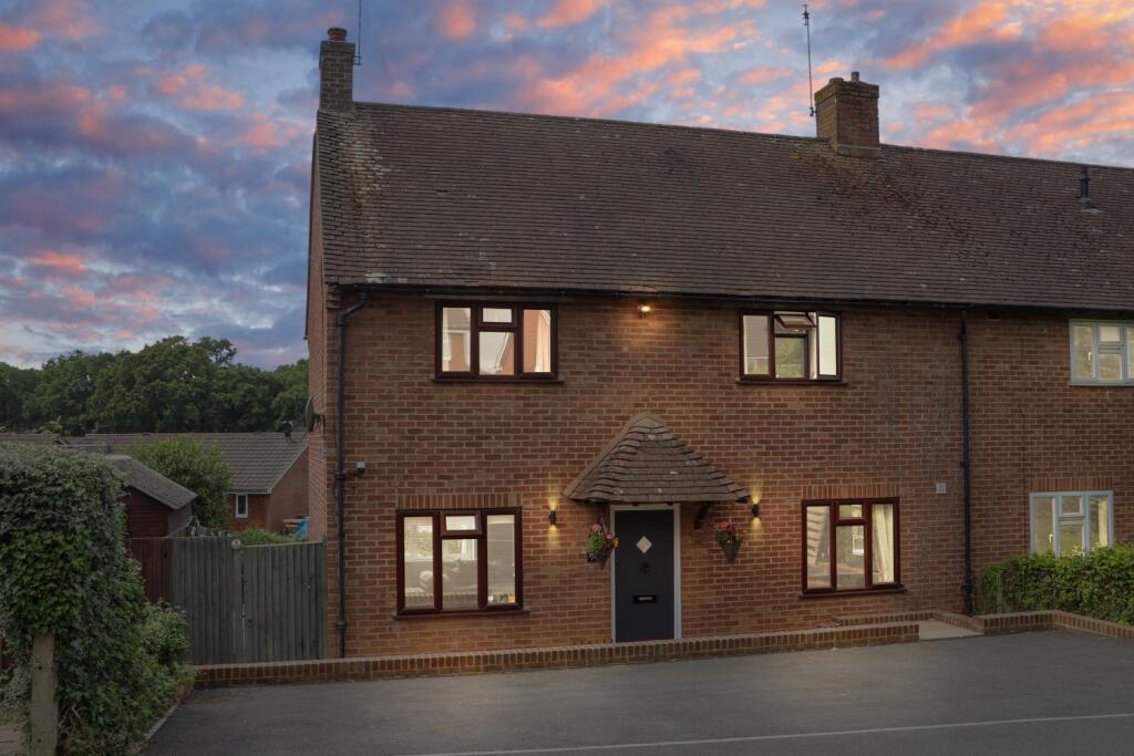 Main image of property: 75 The Oval, Wood Street Village, Guildford