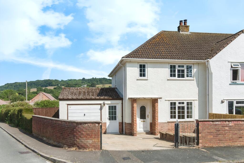 Main image of property: Wesley Close, Bridport, DT6