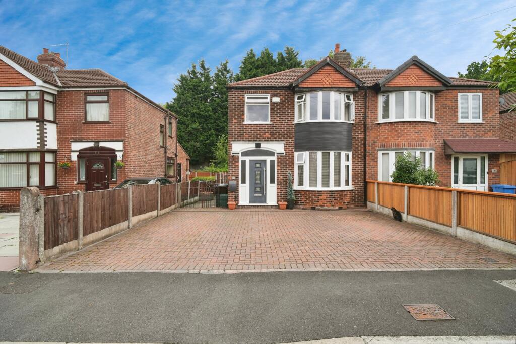 Main image of property: Castleton Avenue, Manchester, M32