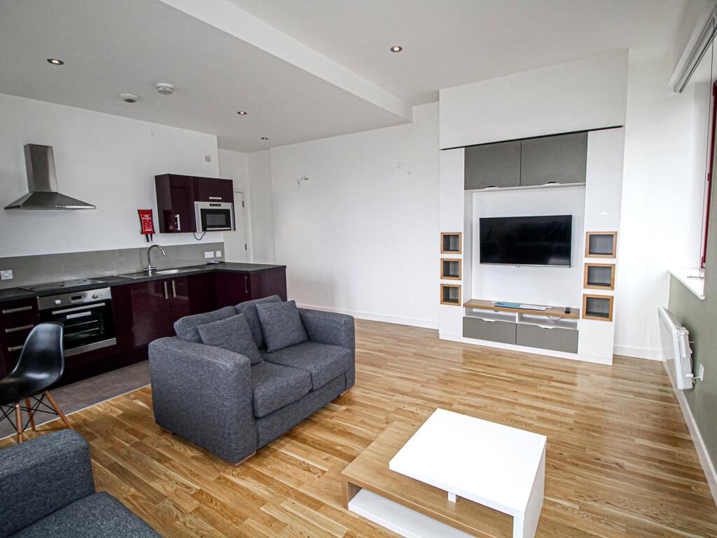 Main image of property: Apt 2, Q One Residence #292073