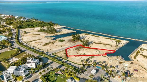 Main image of property: Diamond's Edge Waterfront Estate, West Bay Beach North, Cayman