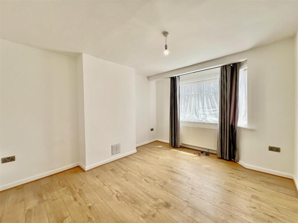 Main image of property: Elmcroft Close, Feltham, TW14