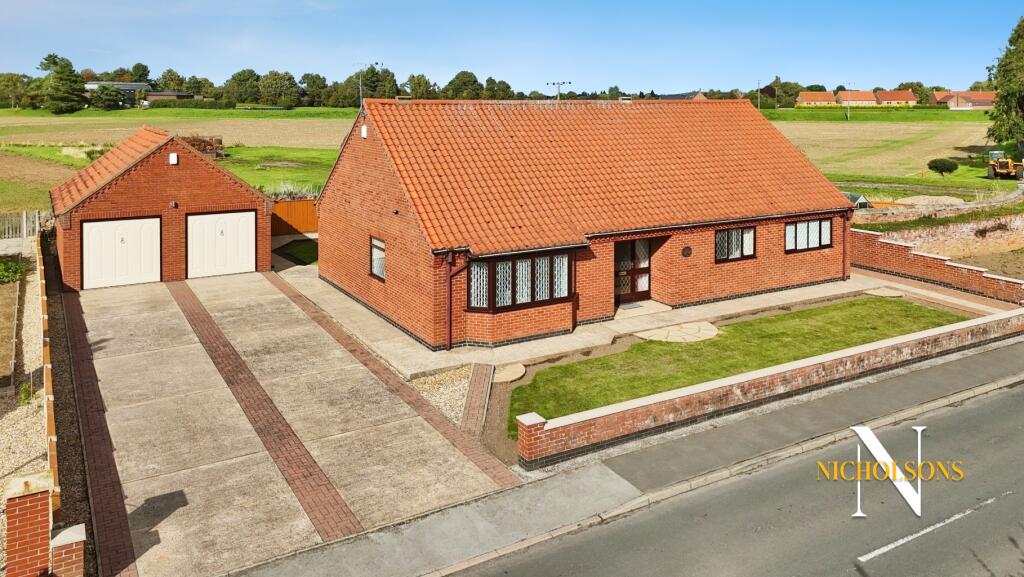 Main image of property: A substantial, beautifully maintained bungalow with a double garage, in a great location!