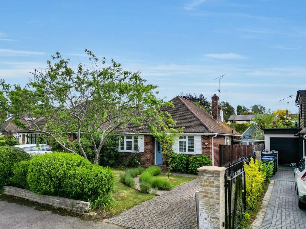 Main image of property: Glenavon Close, Claygate, KT10