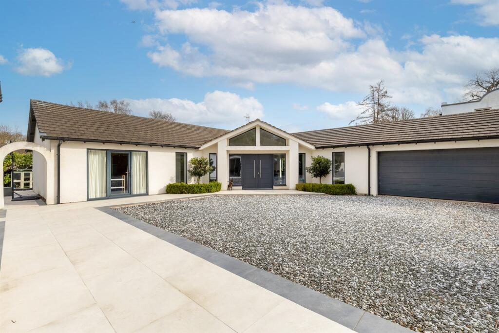 Main image of property: Contemporary bungalow with annex in small private lane just off Chester Road