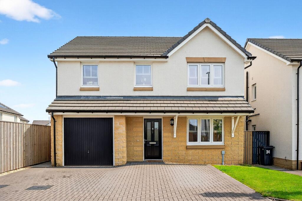 Main image of property: 36 Bessie Graham Court, Kilwinning, KA13 7EU