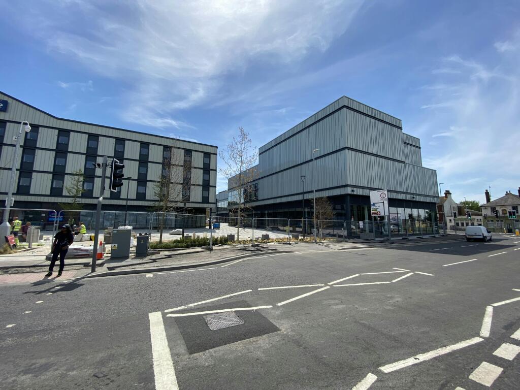 Unit 1  Hotel view south from station.JPG