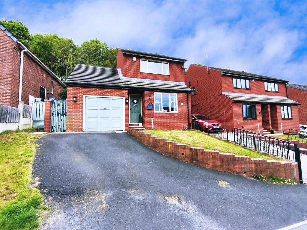 Main image of property: Redland Grove, Staincross, S75 6LZ