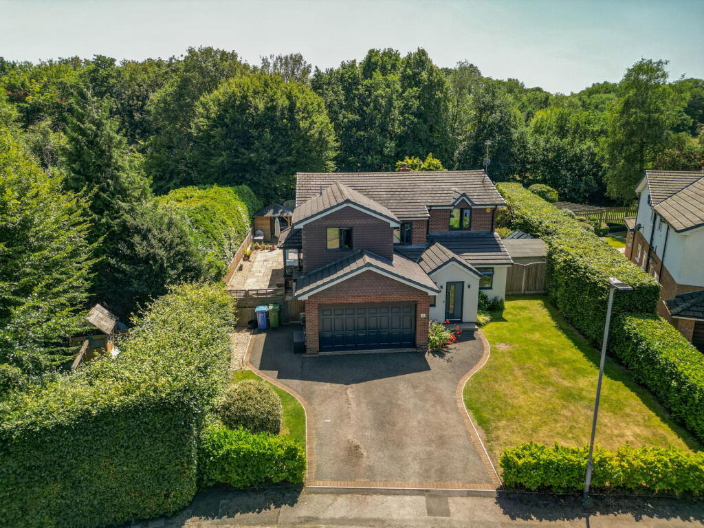 Main image of property: Crown Green, Lymm, WA13 9JG