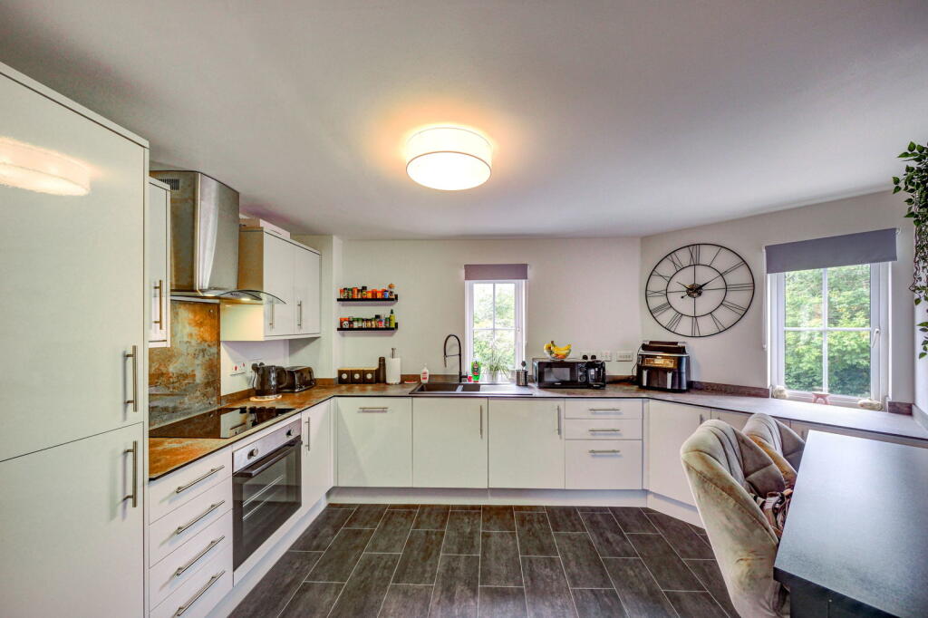 Main image of property: Springbank Gardens, Lymm WA13 9GR