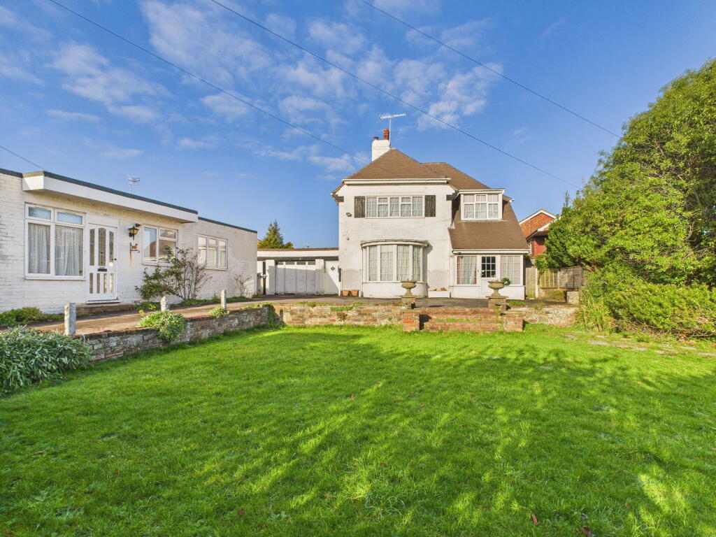 Main image of property: White Halls, West Street, Sompting, BN15 0DA