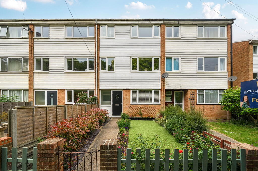 Main image of property: Modern Terraced Home with Integral Garage in Parkwood Green, Rainham