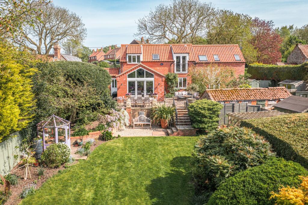 Main image of property: Charming Detached Home with Landscaped Garden in Hempstead