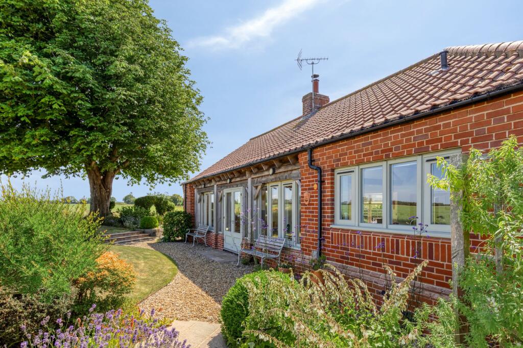 Main image of property: Chain-Free Home on the Edge of Binham, with Exceptional Countryside Views and Contemporary Comfort
