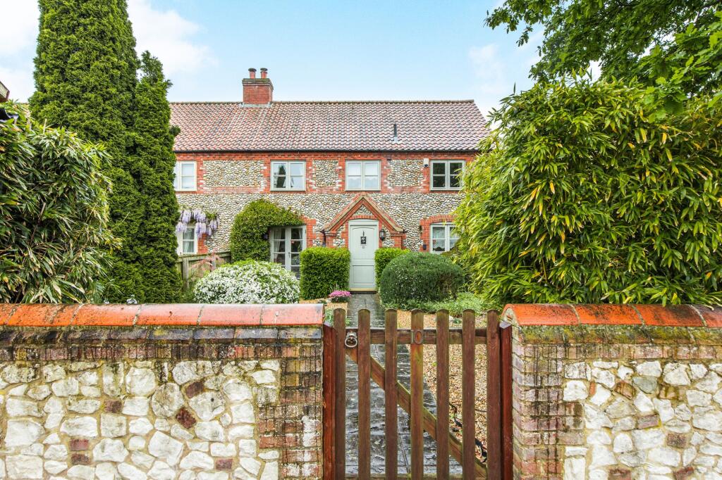 Main image of property: Charming Brick and Flint Cottage Tucked Away in a Peaceful Spot in Docking