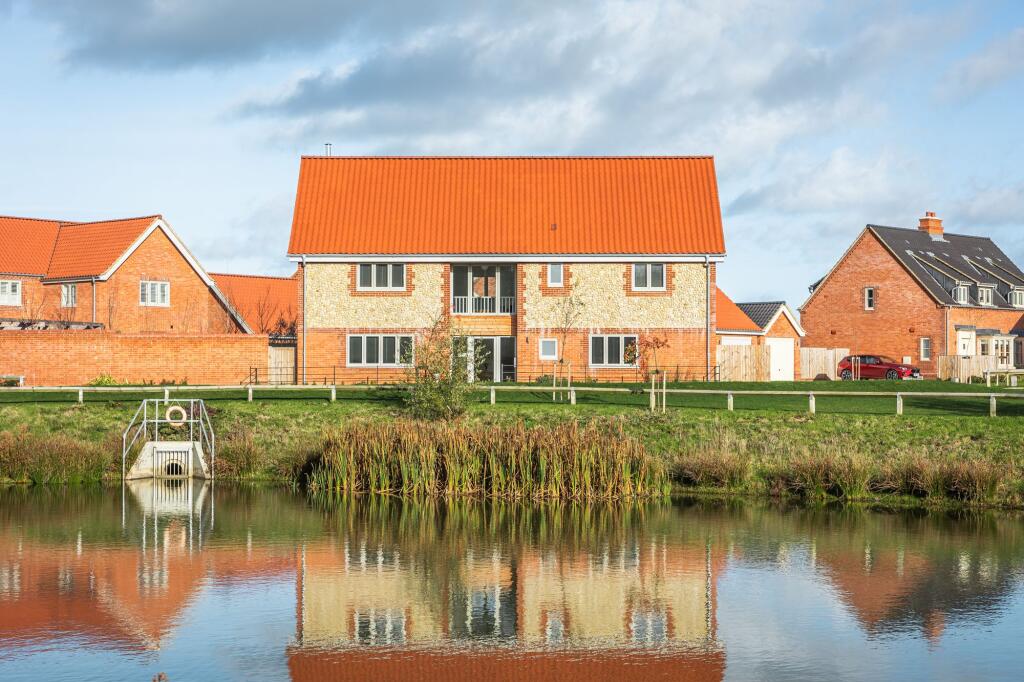 Main image of property: Detached Home with Pond Views in Docking