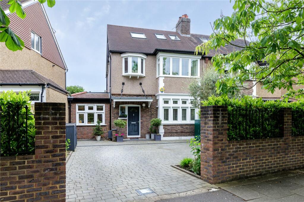 Main image of property: Mostyn Road, London, SW19