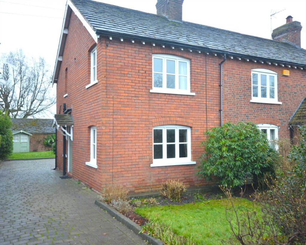 Main image of property: Chester Road, Woodford, SK7 1PR