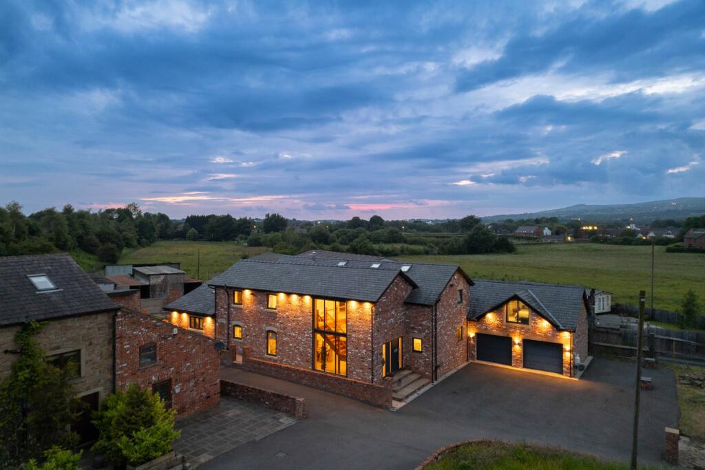 Main image of property: Experience luxury modern living at Oak Stables in Lostock. Built in 2015.