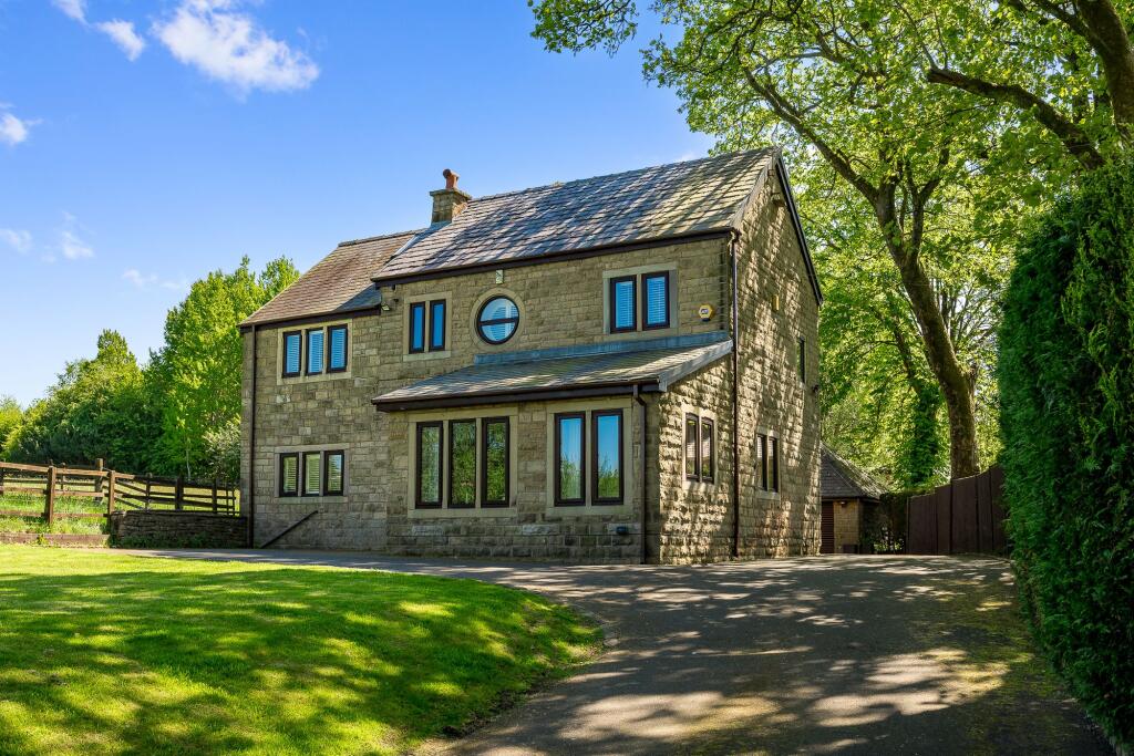 Main image of property: Ainscow House, Dunscar Fold, BL7 | Secluded Stone Barn Conversion with Stunning Gardens & Stylish Interiors