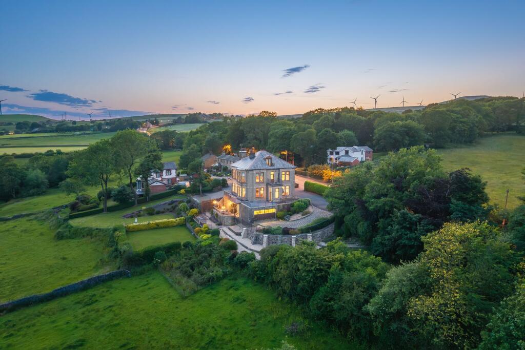 Main image of property: Sunnyside House, Edenfield Road, OL12 | 5-Bed home with approx. 1.7 acres and sweeping countryside views