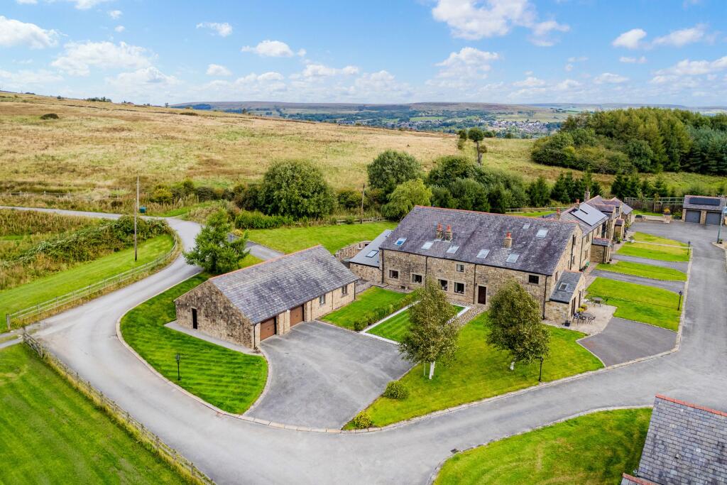 Main image of property: Scout Road, Bolton, BL1 | 4-Bedroom Terraced Barn Conversion in an Exclusive Gated Community